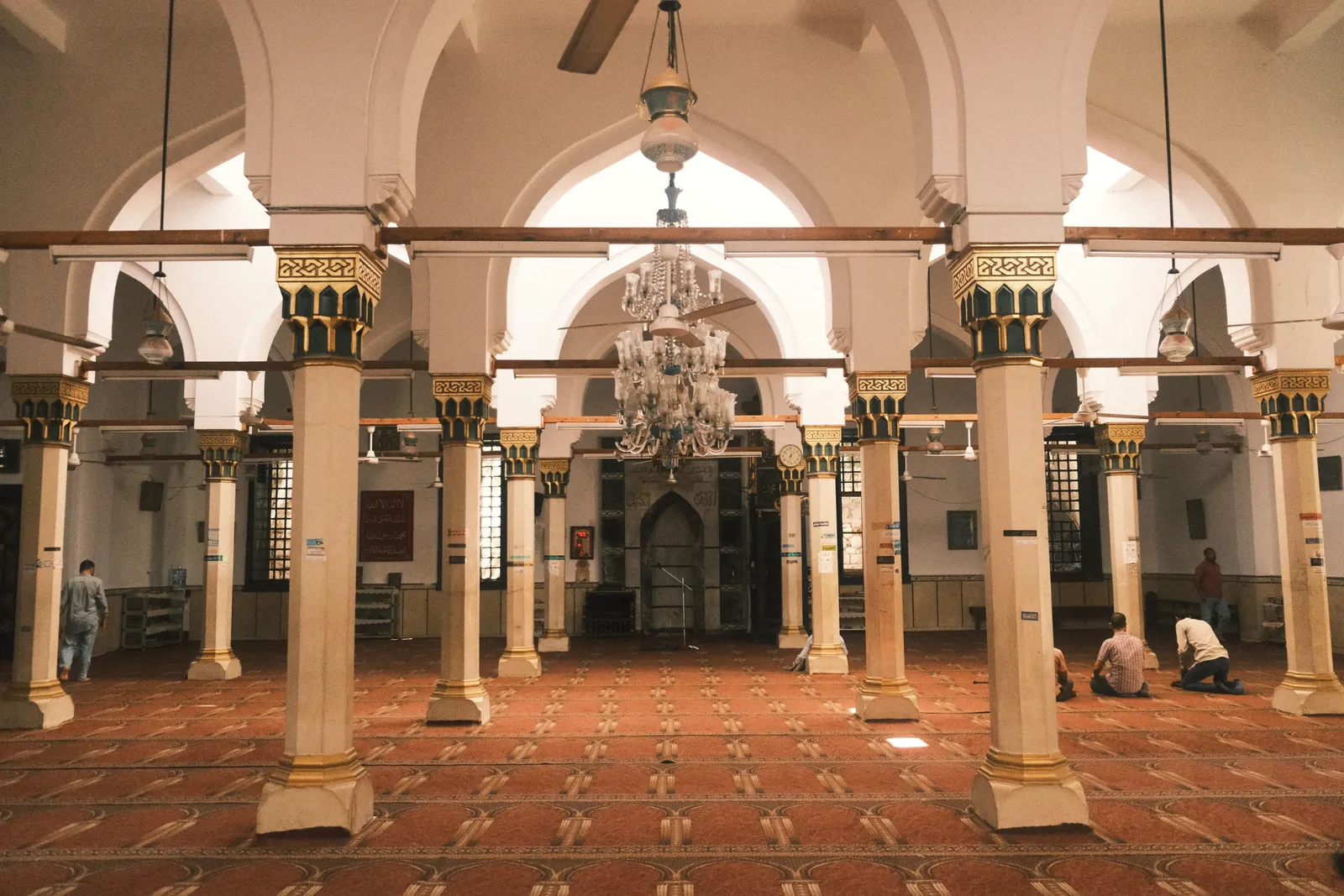 Explore the grandeur of Islamic architecture in an ancient mosque interior, Alexandria, Egypt.