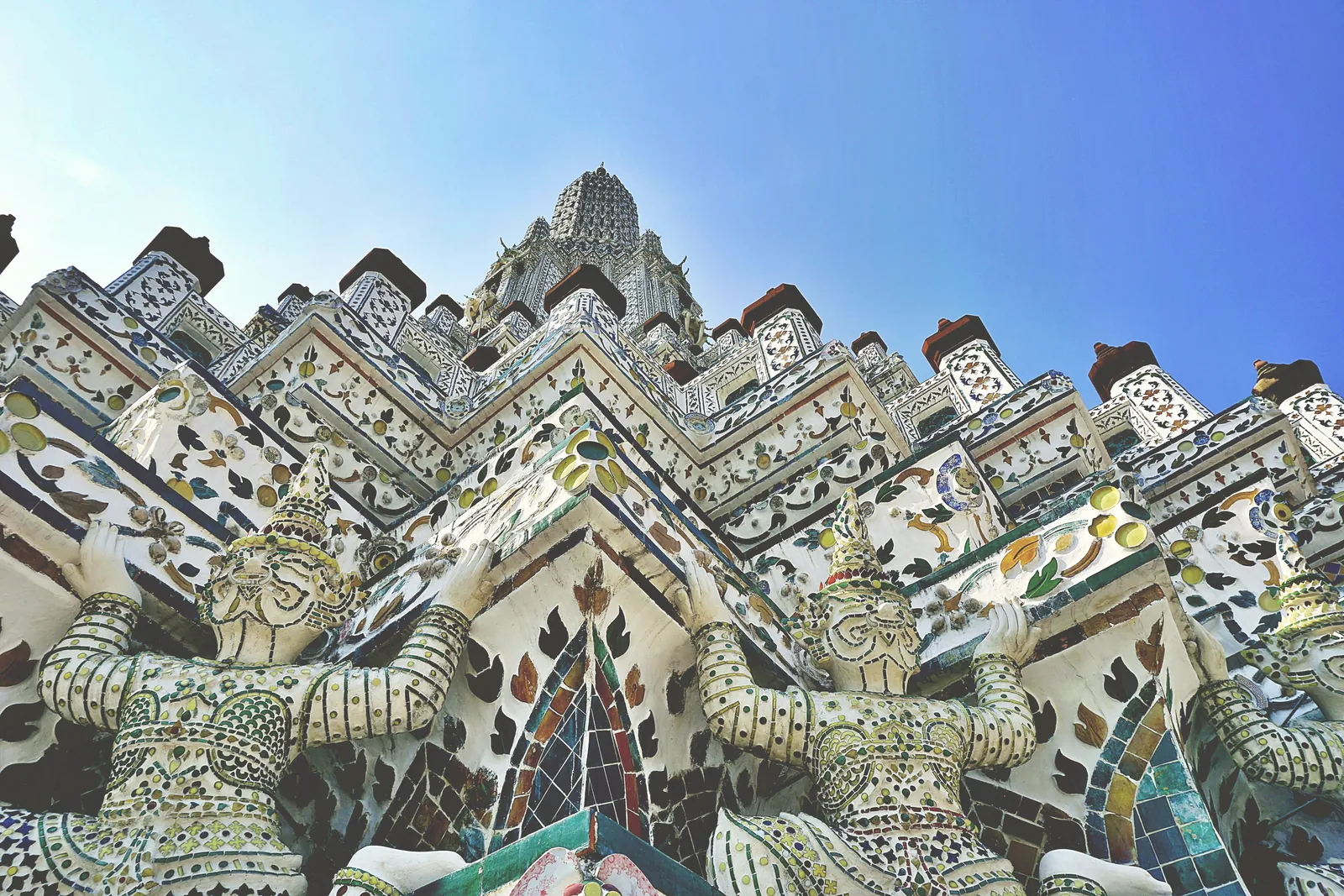 Close-up of the intricate mosaics at Wat Arun temple, Bangkok, Thailand.