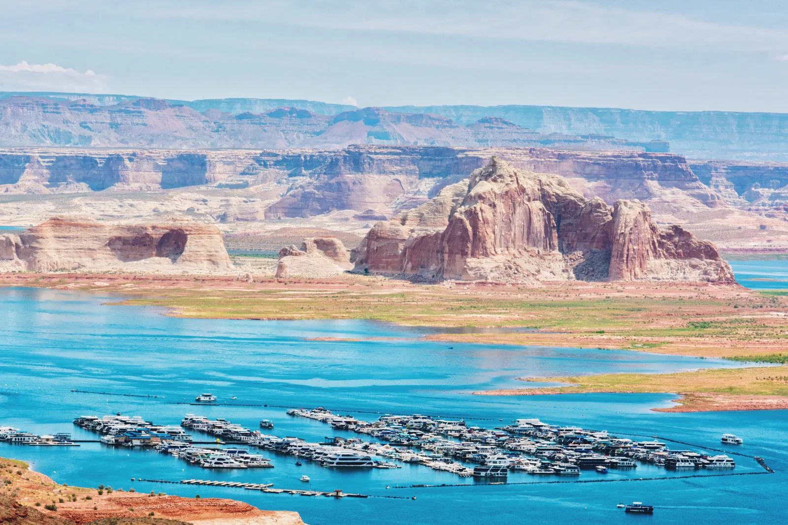 Aerial view of the stunning Lake Powell with boats and dramatic canyons in Arizona.