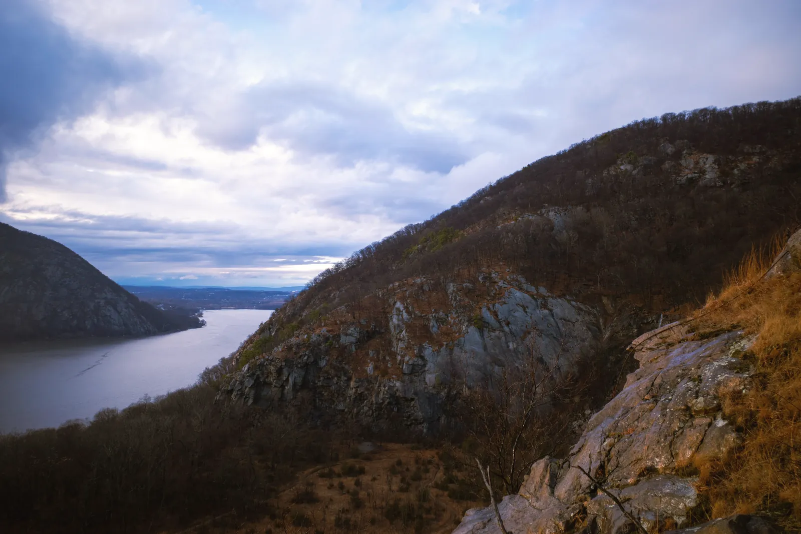 Breathtaking view of the Hudson River flanked by lush hills in Cold Spring, NY.