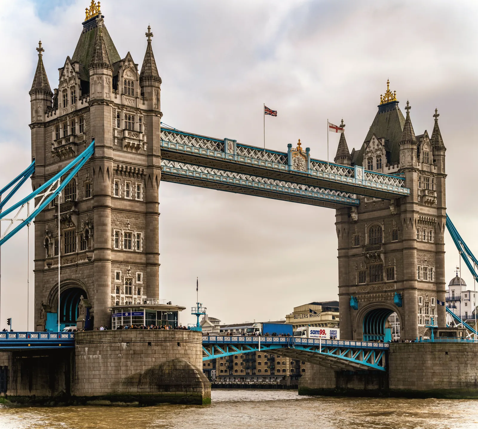 Stunning view of Tower Bridge with gothic architecture spanning the River Thames in London.