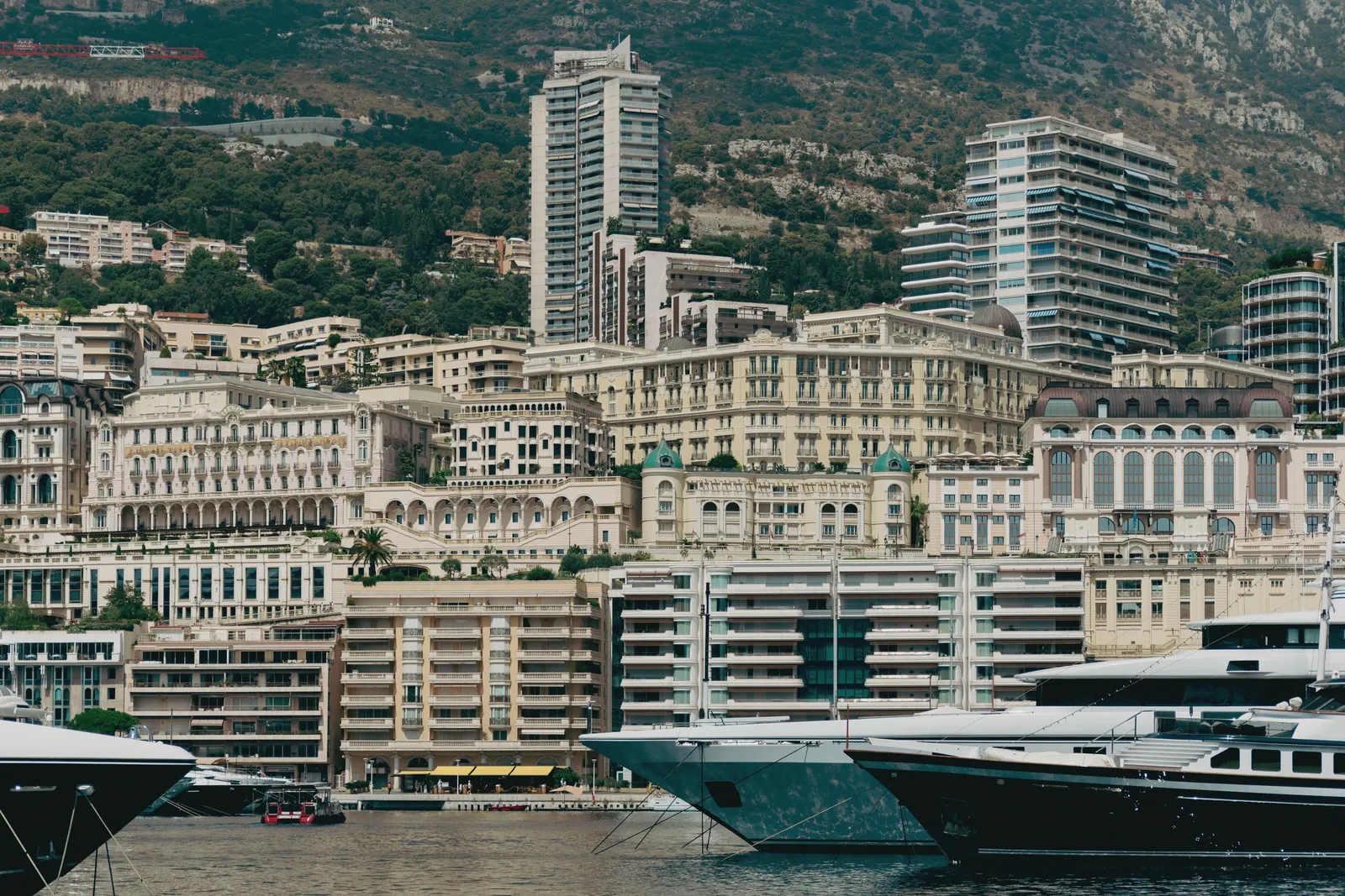 Breathtaking view of Monaco's luxurious harbor showcasing yachts and iconic architecture.