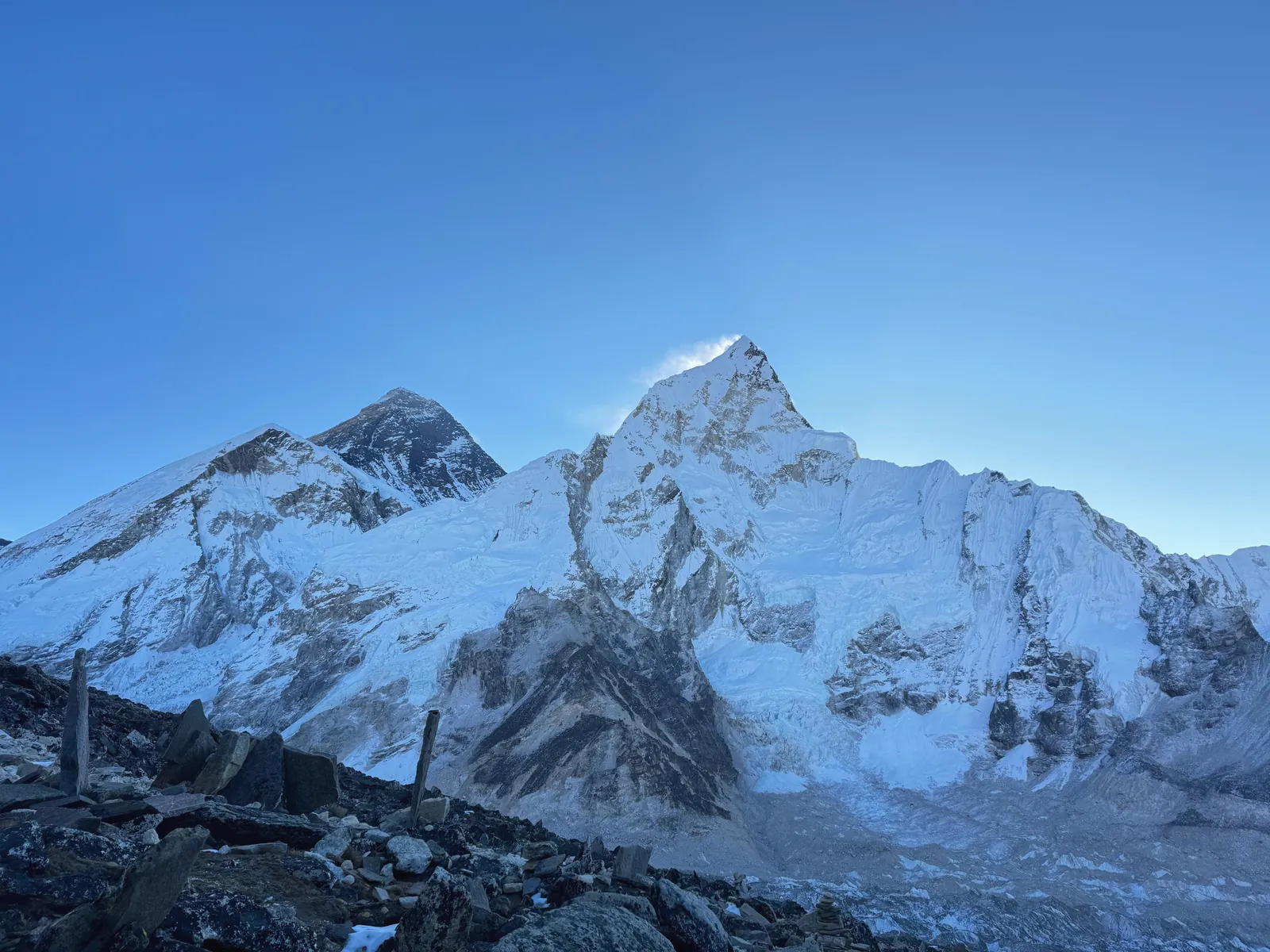 Stunning snowy peaks of Nuptse and Everest in the Himalayas during winter.