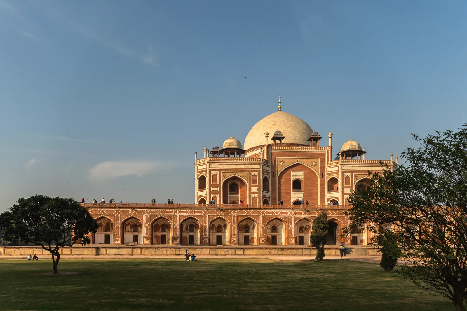 Captivating view of Humayun's Tomb, a UNESCO heritage site in New Delhi, India, at sunrise.