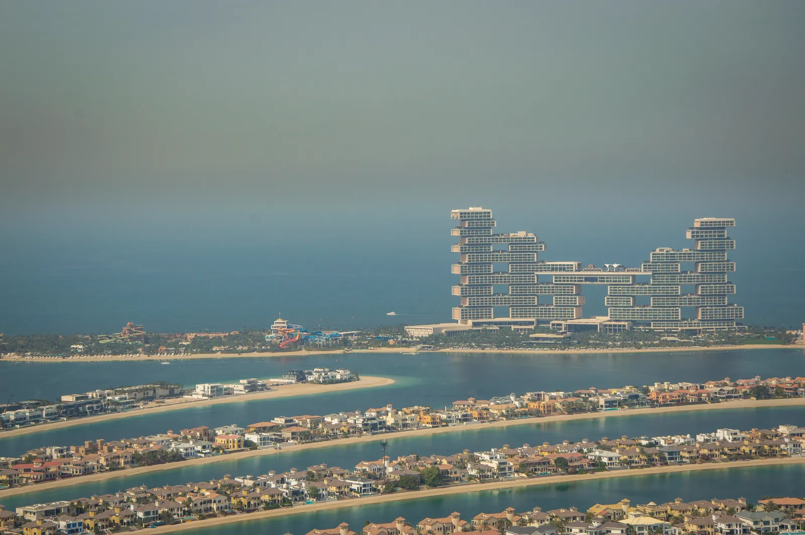 An aerial view of Atlantis The Royal luxury resort on Dubai's Palm Jumeirah with residential villas.