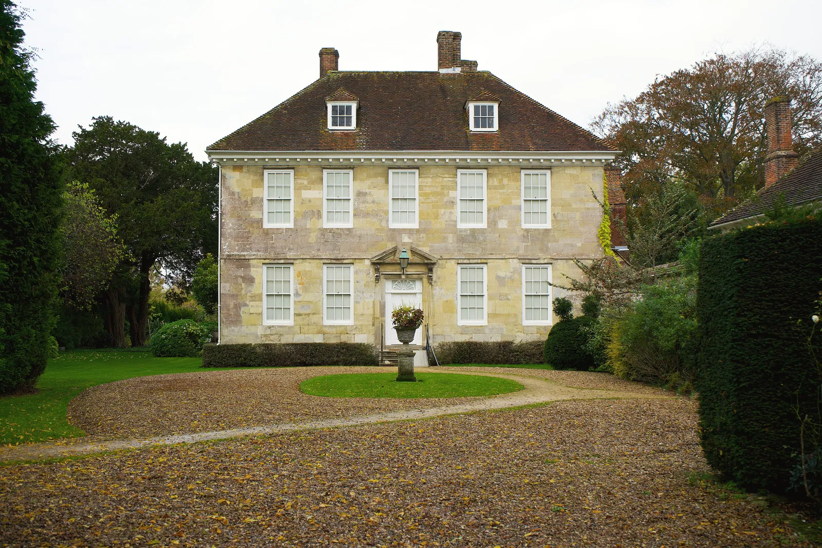 Classic English manor surrounded by lush gardens in Salisbury, UK.