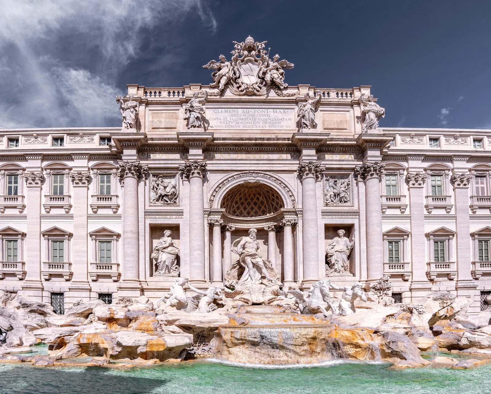 Stunning view of the iconic Trevi Fountain in Rome, showcasing intricate sculptures and architecture.