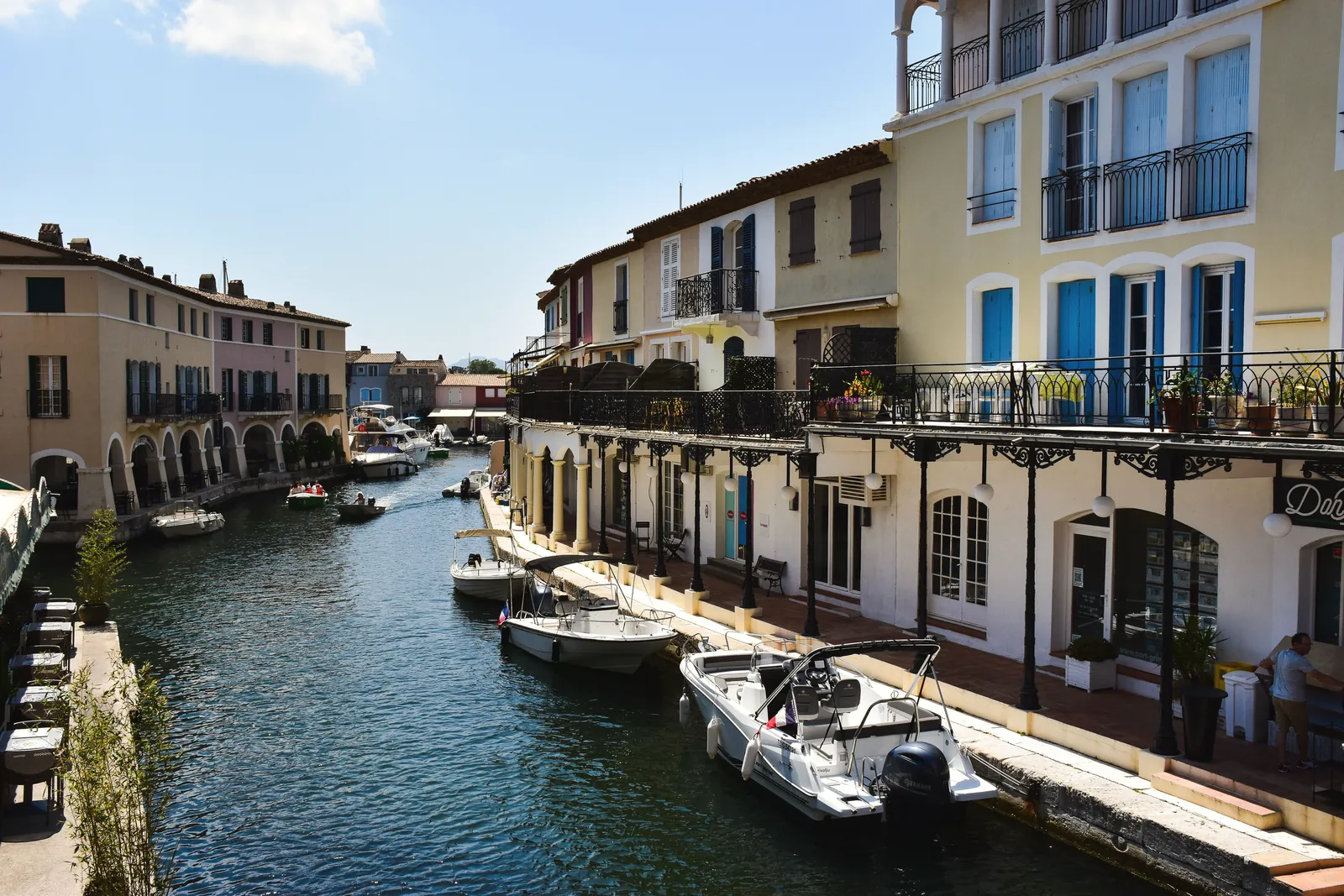 A picturesque view of boats along the canals of Port Grimaud in the French Riviera.