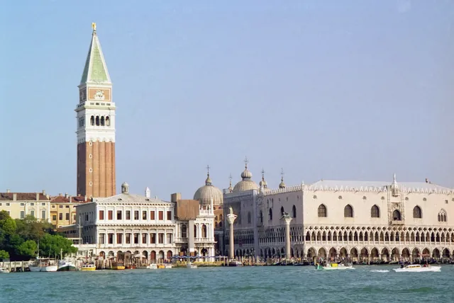 View of St Mark's Campanile and Doge's Palace, iconic landmarks in Venice, Italy.