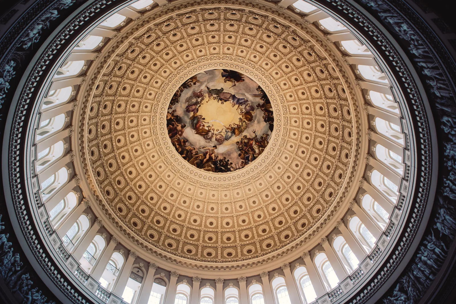 Stunning view of the United States Capitol Rotunda's ornate dome from below.