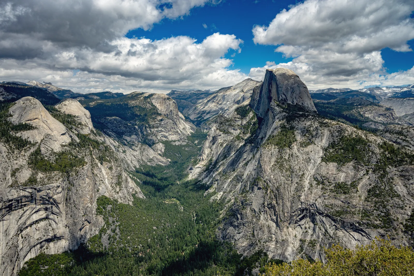 Stunning aerial view of Half Dome at Yosemite National Park, showcasing California's iconic landscape.